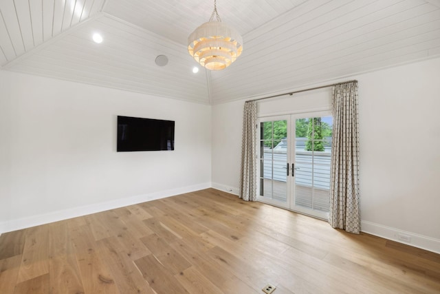 304 Berry Cir, Franklin, TN 37064 - empty room featuring wood ceiling, baseboards, lofted ceiling, wood finished floors, and a chandelier