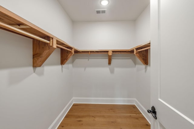 304 Berry Cir, Franklin, TN 37064 - spacious closet featuring wood finished floors