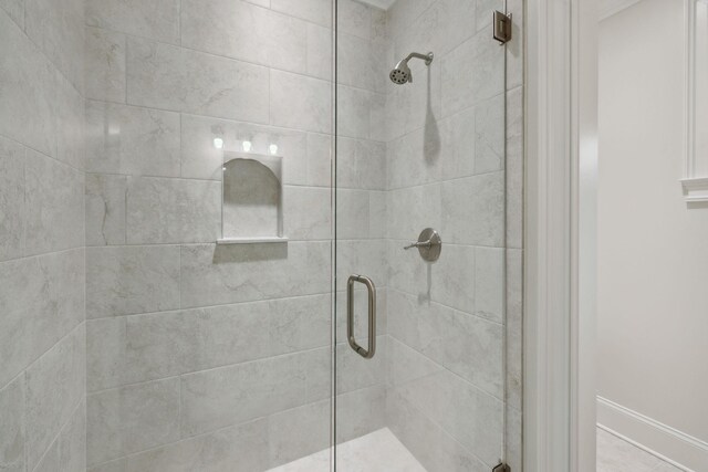 304 Berry Cir, Franklin, TN 37064 - full bath featuring a stall shower and baseboards