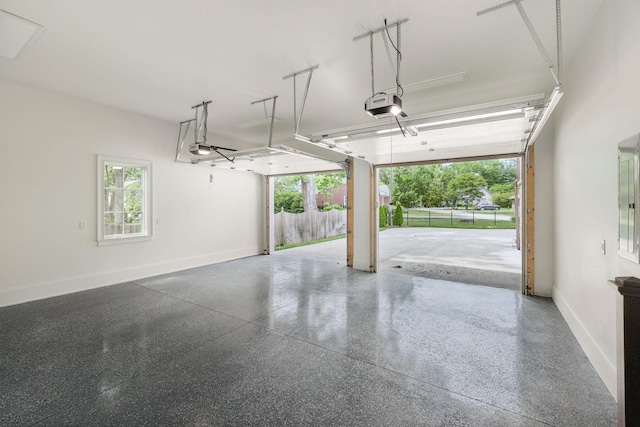 304 Berry Cir, Franklin, TN 37064 - garage with baseboards and a garage door opener