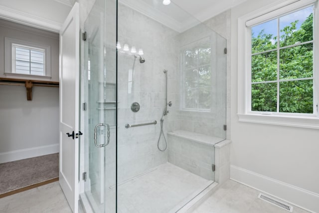 304 Berry Cir, Franklin, TN 37064 - full bath with a shower stall, healthy amount of natural light, ornamental molding, and baseboards
