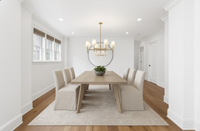 304 Berry Cir, Franklin, TN 37064 - dining area with a chandelier, wood finished floors, ornamental molding, baseboards, and recessed lighting