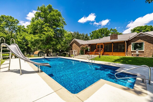 116 Jackson Ln, Hendersonville, TN 37075 - view of swimming pool with a water slide, a sunroom, a patio area, and a yard