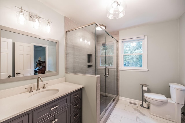 116 Jackson Ln, Hendersonville, TN 37075 - bathroom featuring toilet, a stall shower, vanity, marble look tile flooring, and baseboards