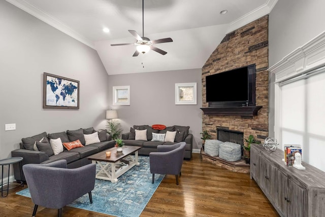 117 Brixton Rdg, Lebanon, TN 37087 - living room with ceiling fan, vaulted ceiling, dark wood-style flooring, a stone fireplace, and ornamental molding