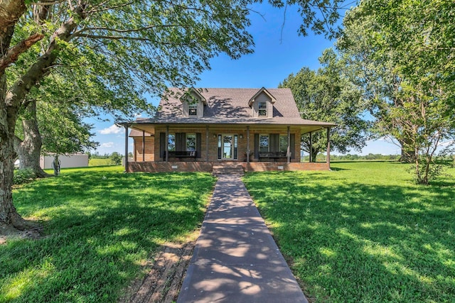 1800 Old Highway 52, Lafayette, TN 37083 - view of front facade featuring a front yard, brick siding, a porch, and roof with shingles