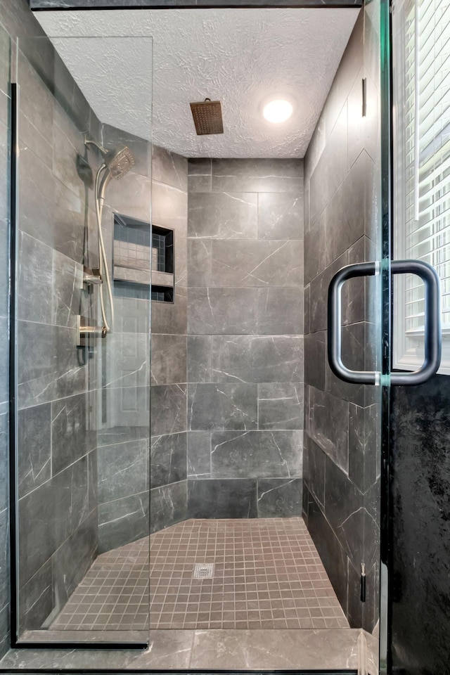 1800 Old Highway 52, Lafayette, TN 37083 - bathroom with a stall shower and a textured ceiling