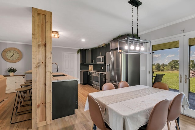 1800 Old Highway 52, Lafayette, TN 37083 - dining area featuring crown molding, french doors, light wood finished floors, and recessed lighting