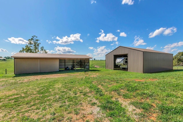 1800 Old Highway 52, Lafayette, TN 37083 - view of green lawn with a pole building, an outbuilding, and a detached garage