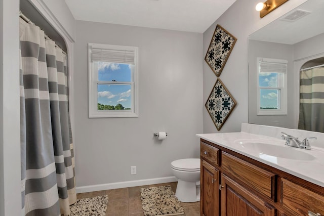 1800 Old Highway 52, Lafayette, TN 37083 - bathroom with baseboards, vanity, toilet, and healthy amount of natural light