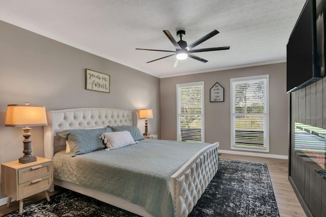 1800 Old Highway 52, Lafayette, TN 37083 - bedroom featuring ornamental molding, light wood-style floors, ceiling fan, and baseboards