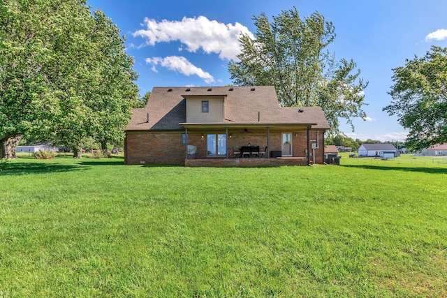 1800 Old Highway 52, Lafayette, TN 37083 - rear view of property with a patio area, a lawn, roof with shingles, and brick siding