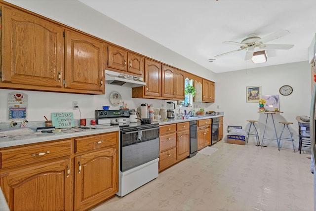 300 Troy Ln, Hohenwald, TN 38462 - kitchen with electric stove, under cabinet range hood, a sink, light countertops, and brown cabinetry