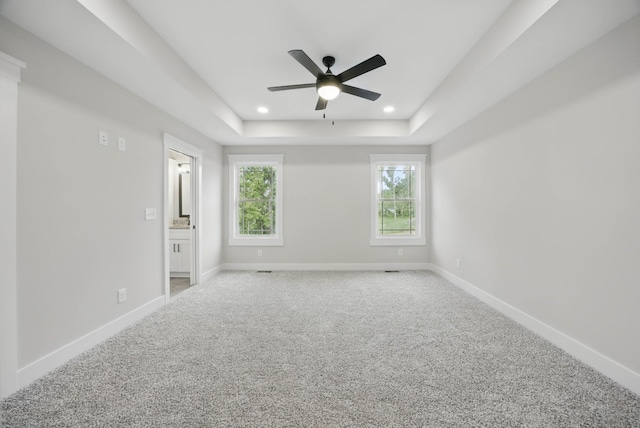 1917 Lewter Dr, Clarksville, TN 37042 - carpeted empty room with a ceiling fan, a tray ceiling, baseboards, and recessed lighting