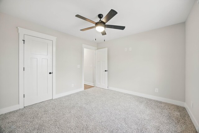 1917 Lewter Dr, Clarksville, TN 37042 - unfurnished bedroom with carpet, baseboards, and ceiling fan