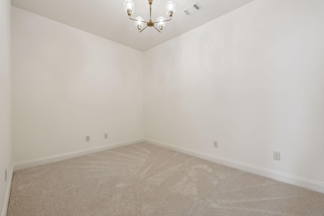 424 Wild Elm St, Franklin, TN 37064 - spare room with light colored carpet, a chandelier, and baseboards