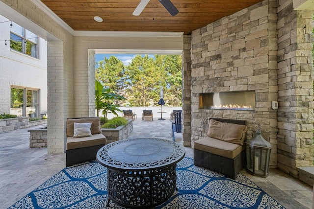 424 Wild Elm St, Franklin, TN 37064 - view of patio with ceiling fan and an outdoor living space with a fireplace