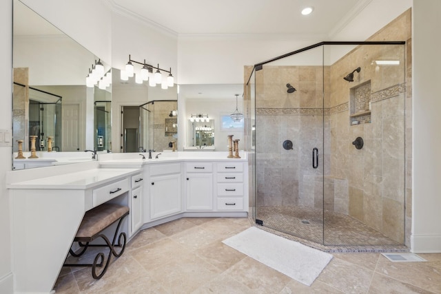 424 Wild Elm St, Franklin, TN 37064 - bathroom featuring ornamental molding, vanity, and a shower stall