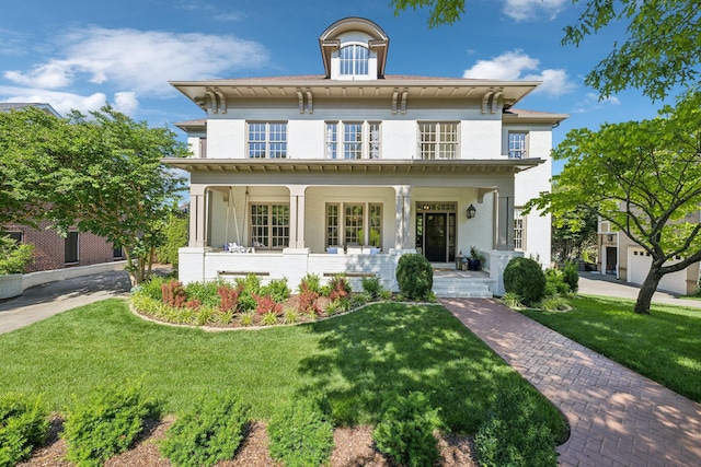 424 Wild Elm St, Franklin, TN 37064 - italianate home featuring covered porch, brick siding, and a front yard
