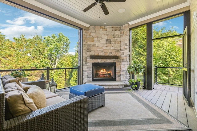 424 Wild Elm St, Franklin, TN 37064 - sunroom / solarium featuring ceiling fan and an outdoor living space with a fireplace