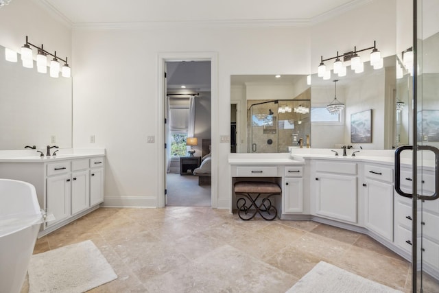 424 Wild Elm St, Franklin, TN 37064 - ensuite bathroom with crown molding, a shower stall, two vanities, a tub to relax in, and baseboards