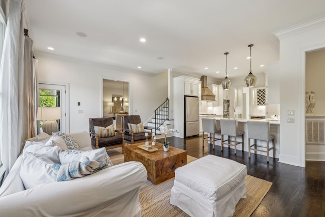 424 Wild Elm St, Franklin, TN 37064 - living room featuring dark wood-type flooring, ornamental molding, recessed lighting, and baseboards