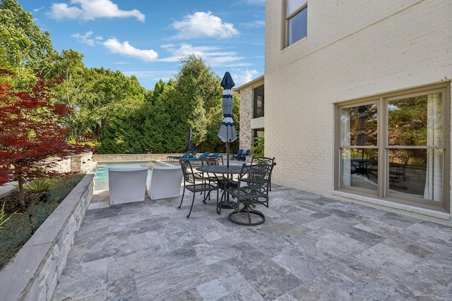 424 Wild Elm St, Franklin, TN 37064 - view of patio featuring an outdoor pool and outdoor dining space