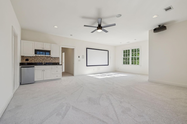 424 Wild Elm St, Franklin, TN 37064 - unfurnished living room with a ceiling fan, light carpet, baseboards, recessed lighting, and a sink