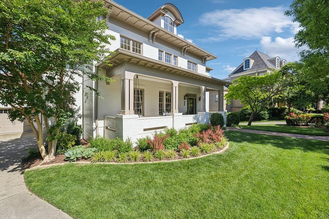 424 Wild Elm St, Franklin, TN 37064 - italianate home with brick siding, a porch, and a front lawn