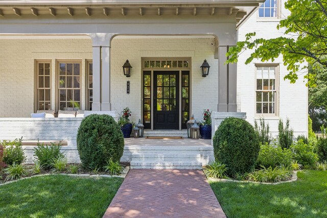 424 Wild Elm St, Franklin, TN 37064 - doorway to property with a porch and brick siding