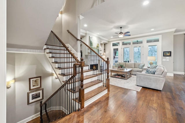 8704 Wolfsbane Ln, College Grove, TN 37046 - living room with a ceiling fan, crown molding, recessed lighting, stairway, and dark wood finished floors