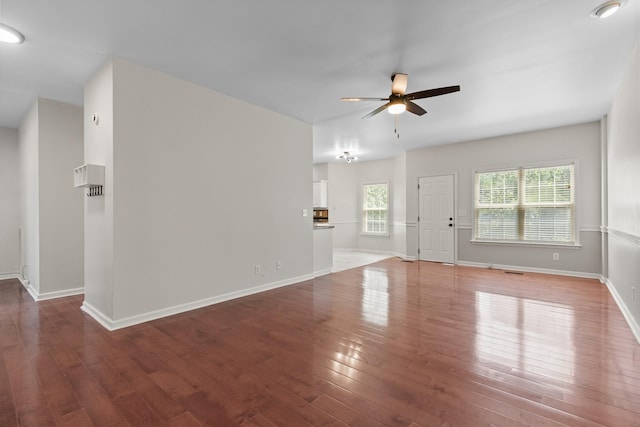2905 Burtonwood Dr, Spring Hill, TN 37174 - unfurnished living room featuring ceiling fan, hardwood / wood-style floors, and baseboards