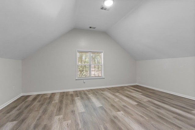 2905 Burtonwood Dr, Spring Hill, TN 37174 - additional living space featuring wood finished floors, lofted ceiling, and baseboards