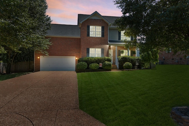 2905 Burtonwood Dr, Spring Hill, TN 37174 - view of front of house with brick siding, driveway, an attached garage, and a shingled roof