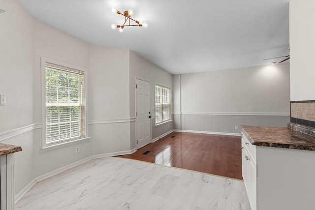2905 Burtonwood Dr, Spring Hill, TN 37174 - entrance foyer featuring a chandelier and baseboards