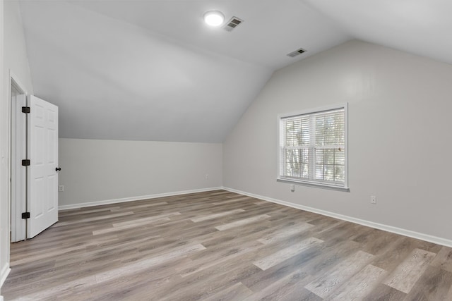 2905 Burtonwood Dr, Spring Hill, TN 37174 - bonus room with vaulted ceiling, wood finished floors, and baseboards