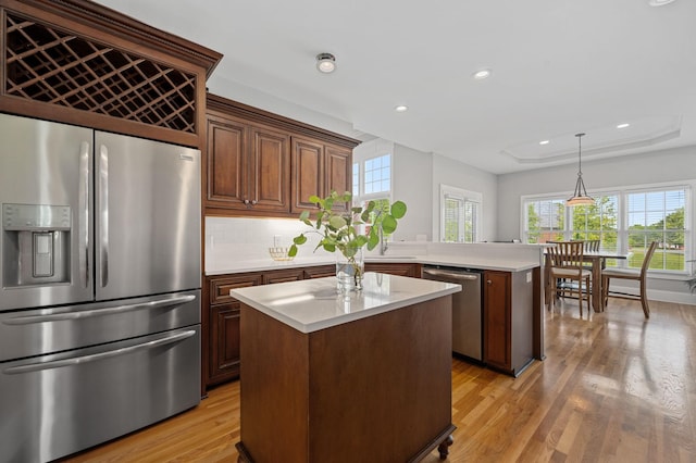 1417 Guill Rd, Mount Juliet, TN 37122 - kitchen with appliances with stainless steel finishes, a peninsula, healthy amount of natural light, light countertops, and recessed lighting