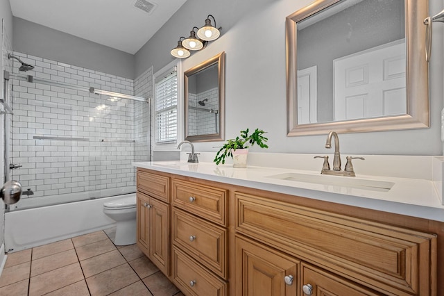 1417 Guill Rd, Mount Juliet, TN 37122 - bathroom with double vanity, toilet, shower / tub combination, and tile patterned floors