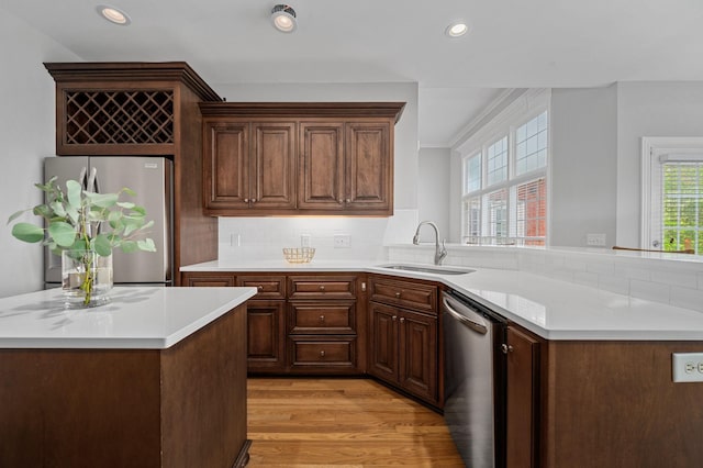 1417 Guill Rd, Mount Juliet, TN 37122 - kitchen with appliances with stainless steel finishes, a sink, light countertops, recessed lighting, and tasteful backsplash