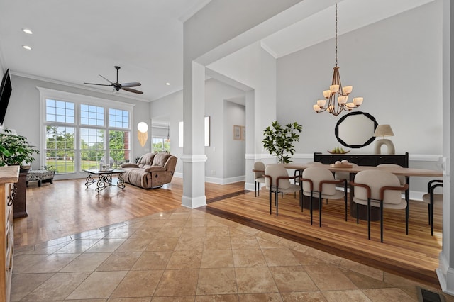 1417 Guill Rd, Mount Juliet, TN 37122 - dining room with crown molding, inlaid floor details, a ceiling fan, a chandelier, and recessed lighting