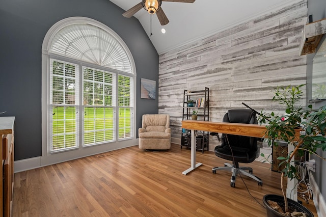 1417 Guill Rd, Mount Juliet, TN 37122 - office area featuring an accent wall, ceiling fan, wood finished floors, baseboards, and high vaulted ceiling