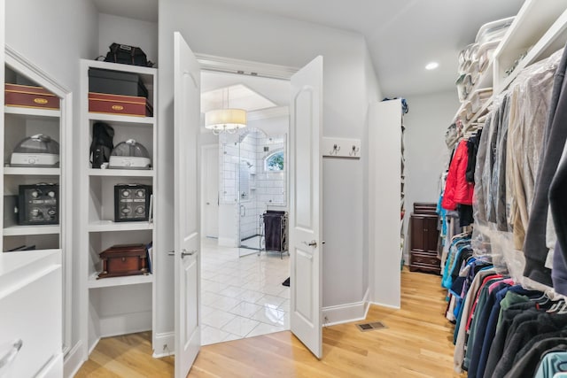 4043 Old Light Cir, Arrington, TN 37014 - walk in closet with light wood-type flooring