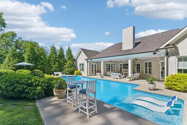4043 Old Light Cir, Arrington, TN 37014 - outdoor pool featuring ceiling fan, an outdoor living space, and a patio area
