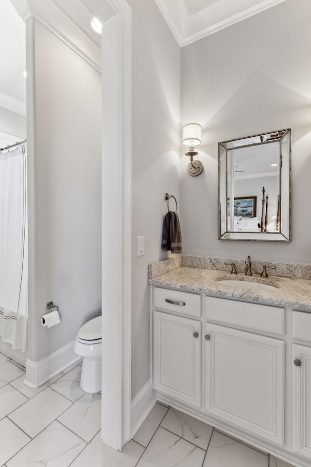 4043 Old Light Cir, Arrington, TN 37014 - bathroom featuring vanity, marble finish floors, toilet, ornamental molding, and baseboards