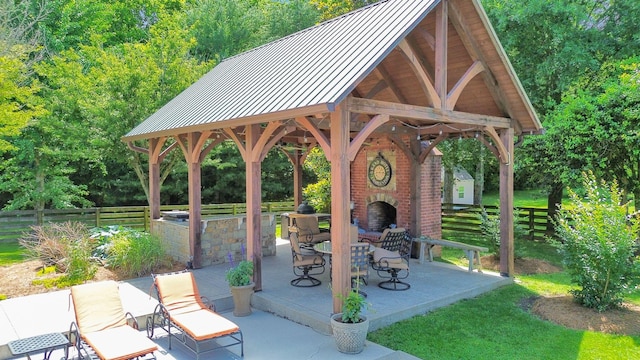 3285 Blazer Rd, Franklin, TN 37064 - view of patio / terrace featuring an outdoor brick fireplace and a gazebo