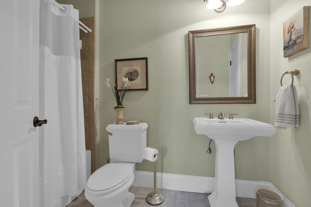 3285 Blazer Rd, Franklin, TN 37064 - full bathroom with toilet, tile patterned flooring, and baseboards
