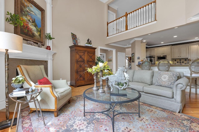 3285 Blazer Rd, Franklin, TN 37064 - living room with a towering ceiling, light wood-type flooring, and ornamental molding