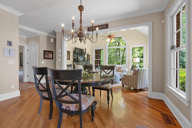 3285 Blazer Rd, Franklin, TN 37064 - dining space with healthy amount of natural light, ornamental molding, light wood-style floors, and baseboards