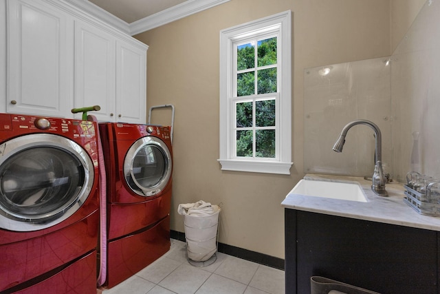 3285 Blazer Rd, Franklin, TN 37064 - laundry area featuring cabinet space, washer and clothes dryer, crown molding, light tile patterned floors, and baseboards