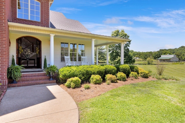 3285 Blazer Rd, Franklin, TN 37064 - property entrance featuring a lawn, covered porch, and a shingled roof